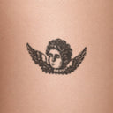 Cherub by John Craig - tattoo render on skin 