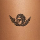 Cherub by John Craig - tattoo render on skin 