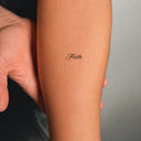 Faith by Blackdot - tattoo render on arm 