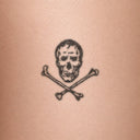 Skull & Crossbones by John Craig - tattoo render on skin 